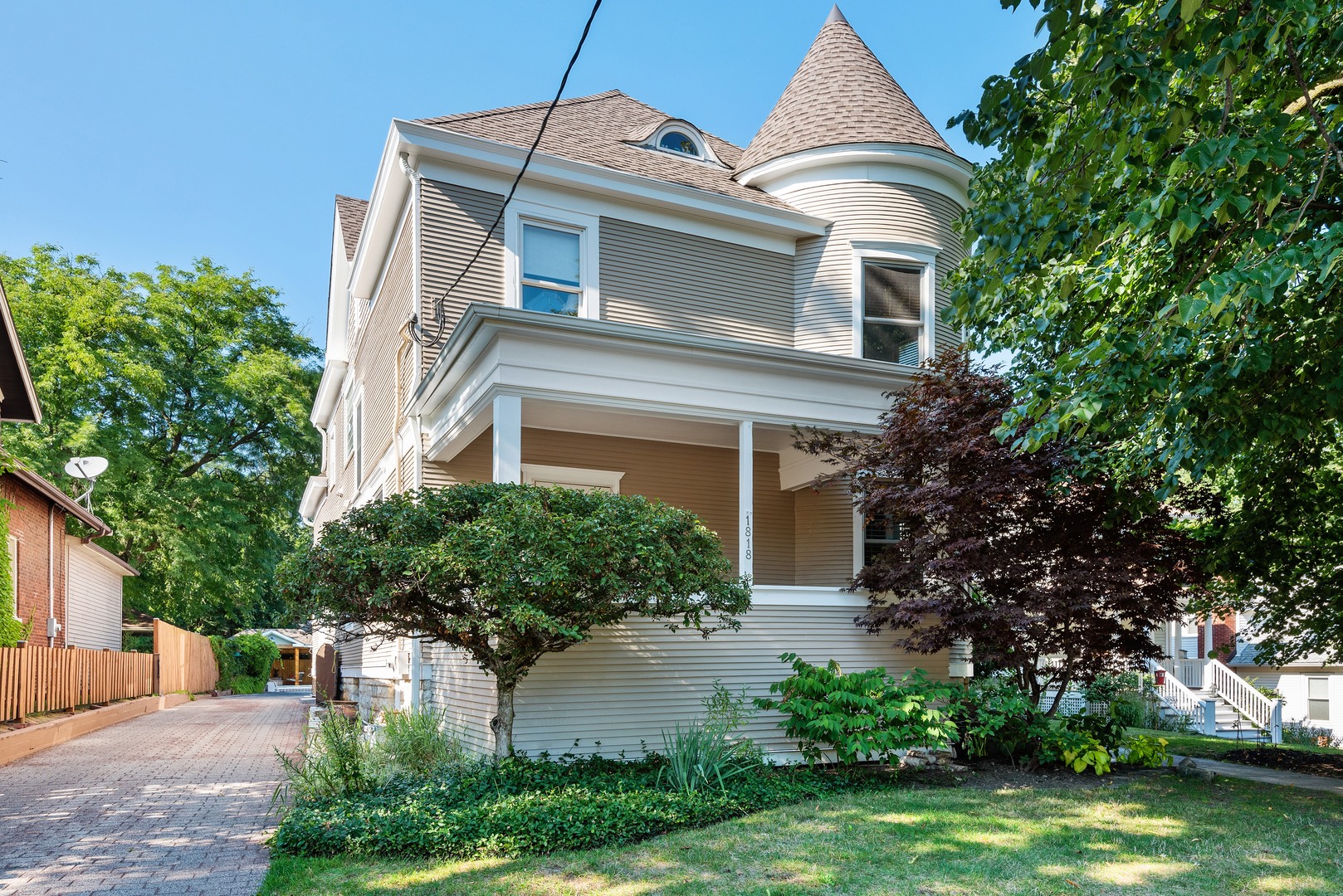 front view of a house with a garden