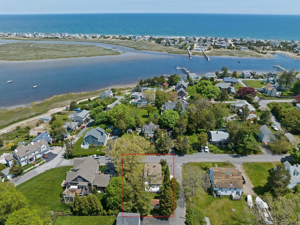 an aerial view of a city and lake view