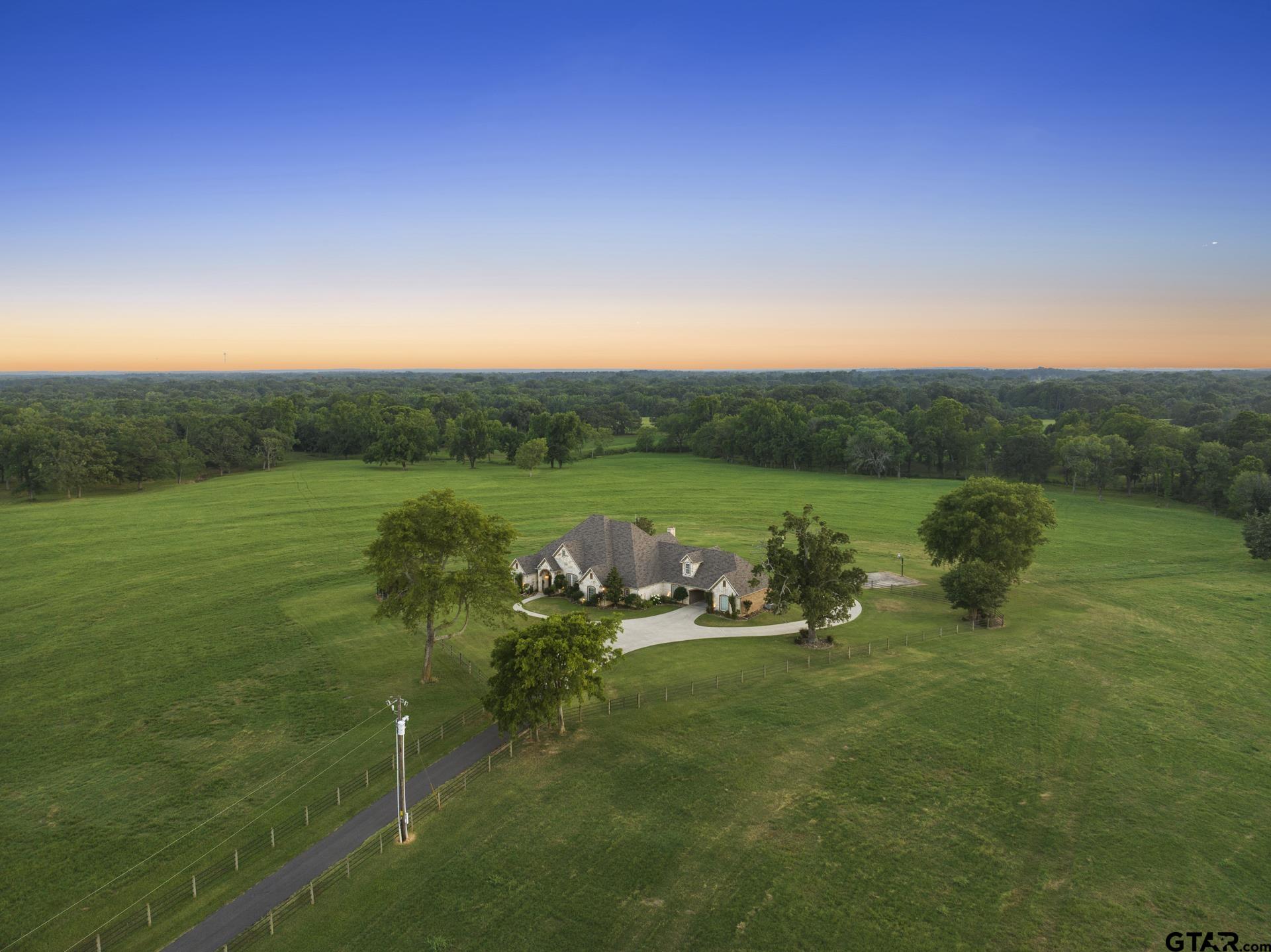 a view of a golf course with a lake