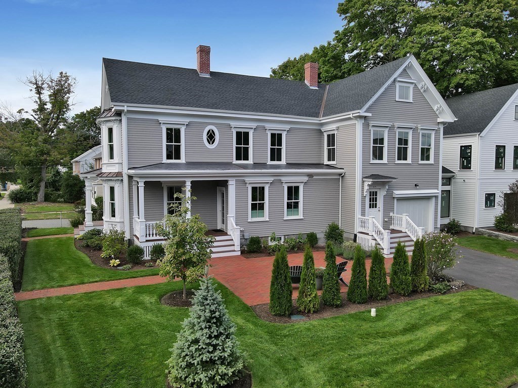 a front view of a house with a yard