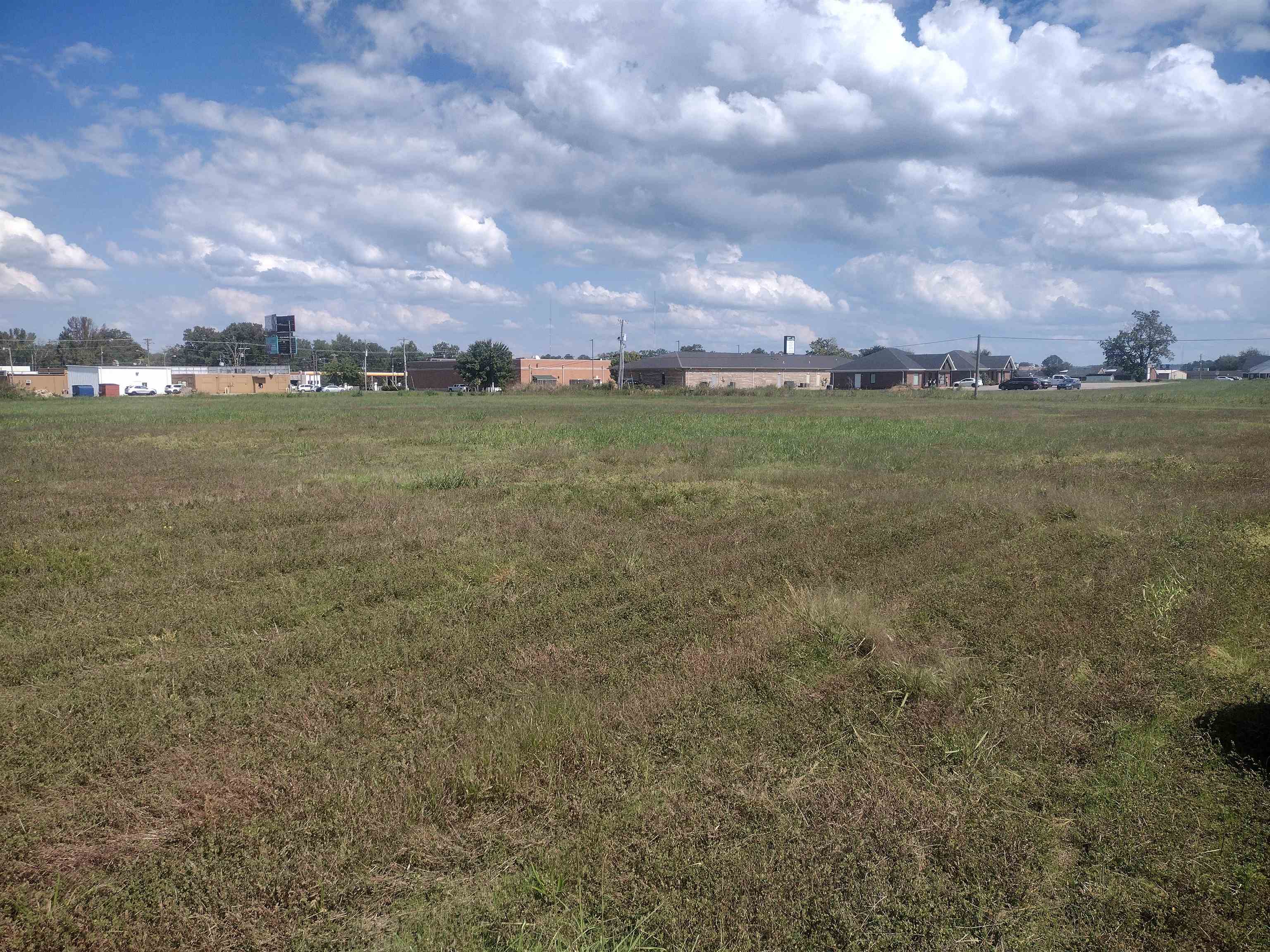 View of yard with a rural view