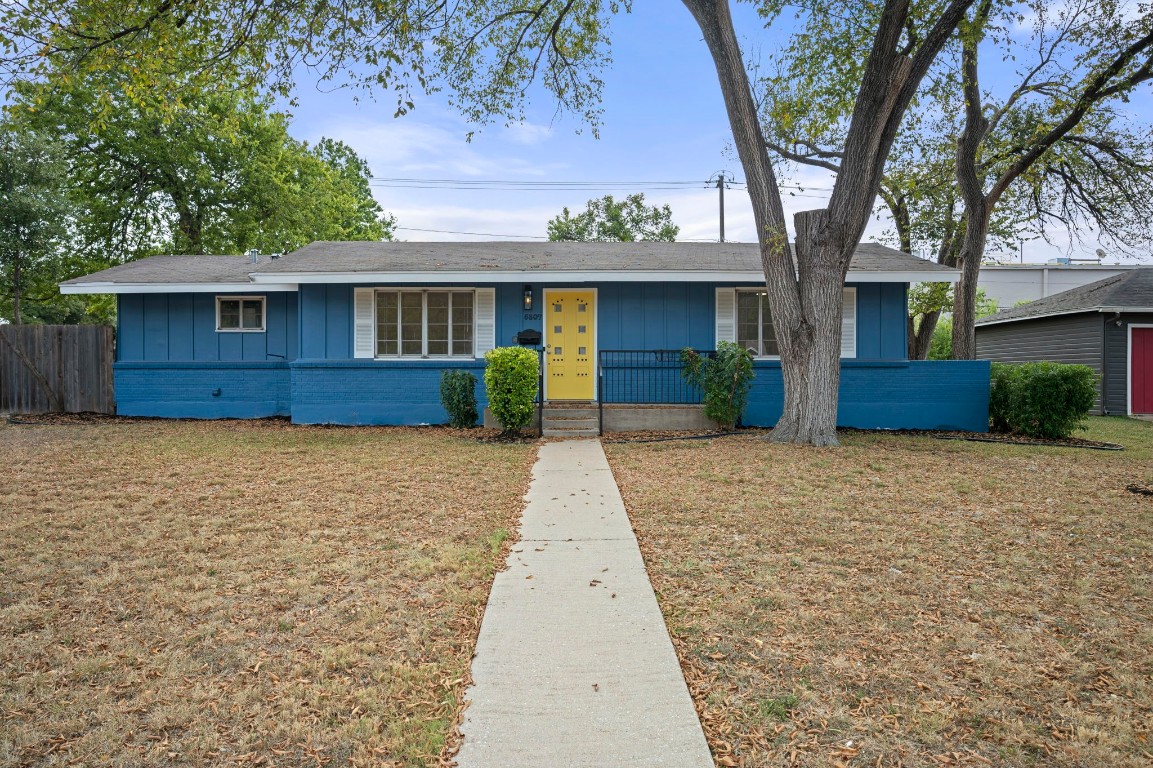 front view of a house with a yard