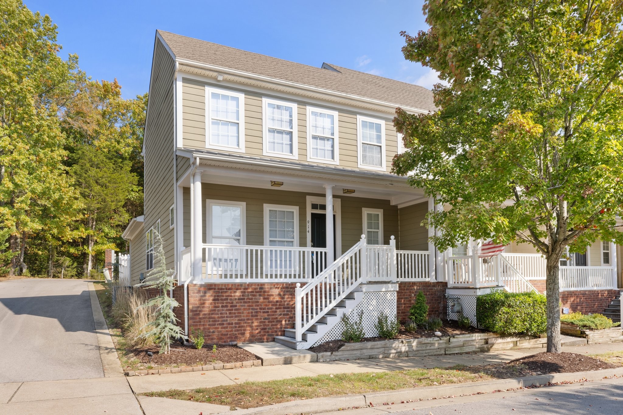 Rare 2 story end unit townhome in popular Lenox Village with Primary Bedroom on the main. Backs to woods!