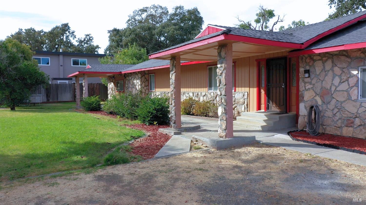 a front view of house with yard