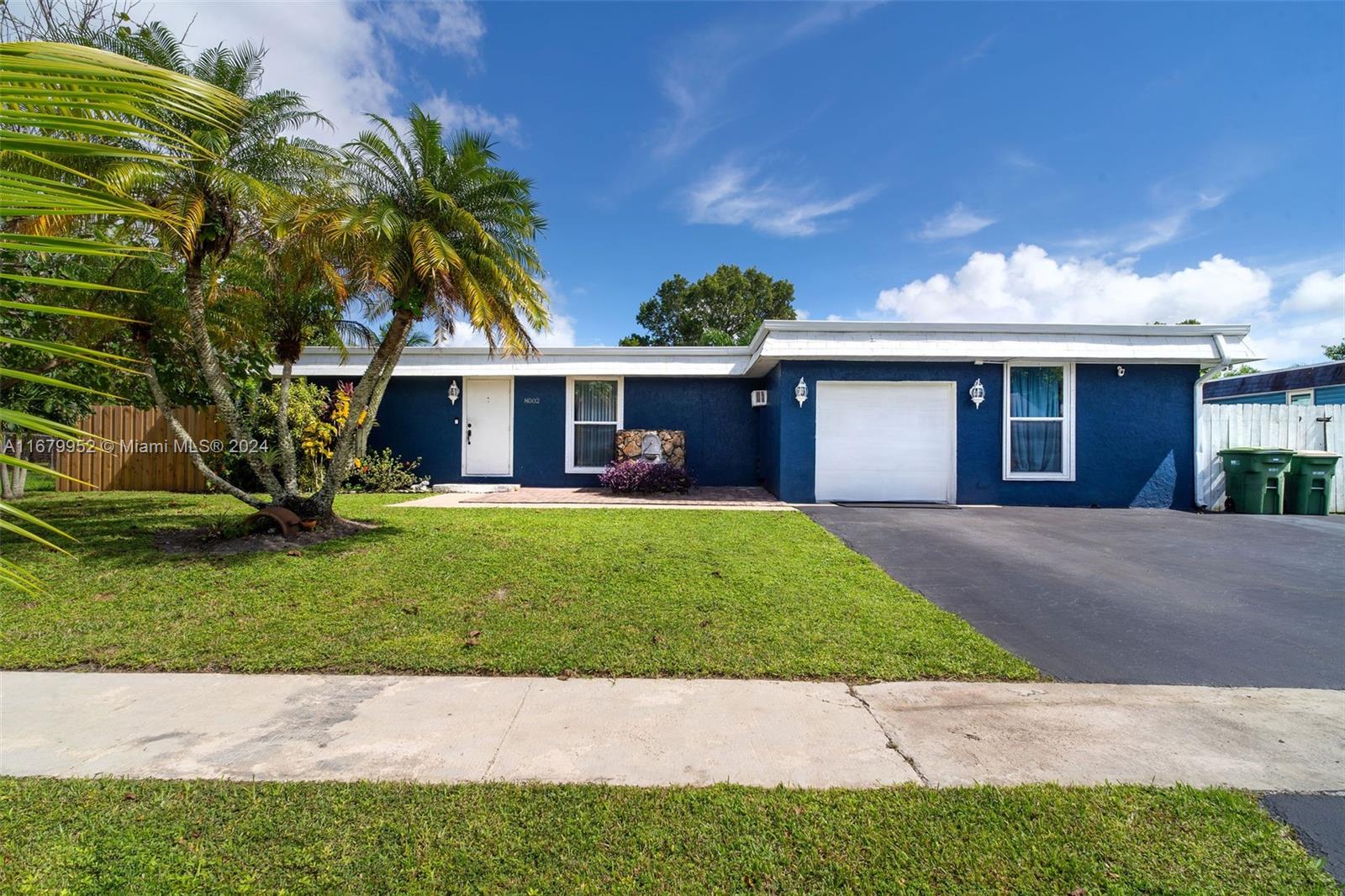 a view front of house with a yard