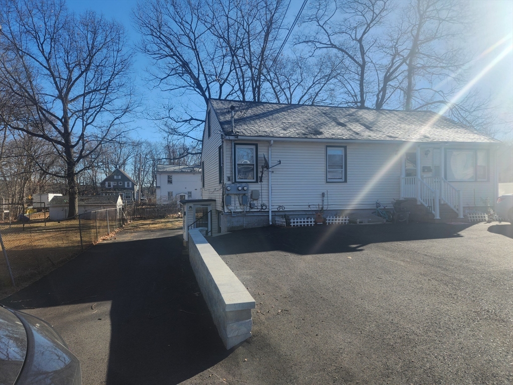 a view of a house with a snow in yard