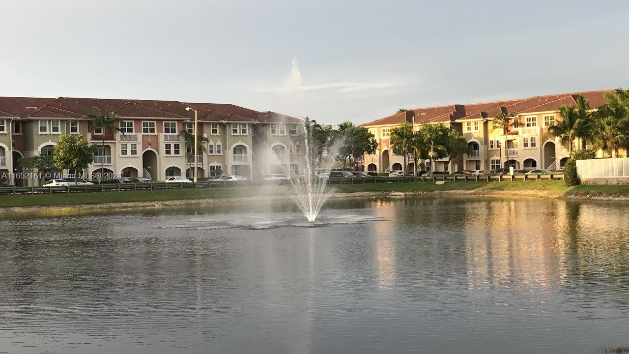 a view of a lake with building