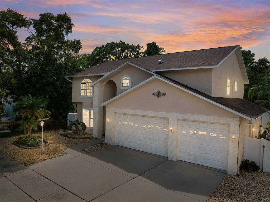 a front view of a house with yard