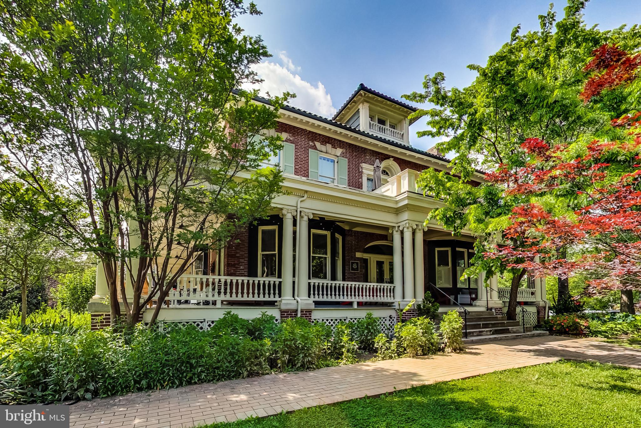 front view of a house with a small yard