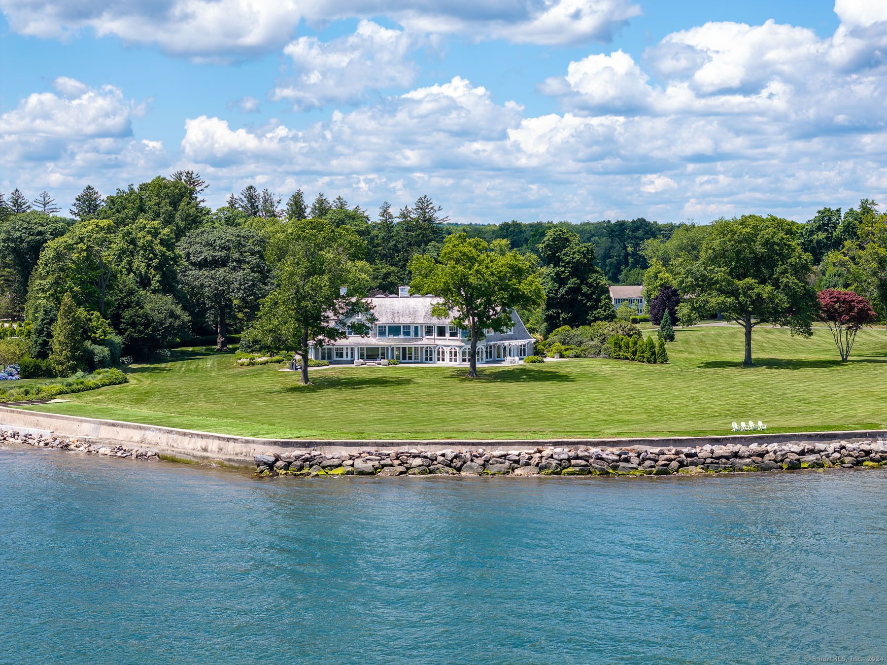 a view of a golf course with a lake