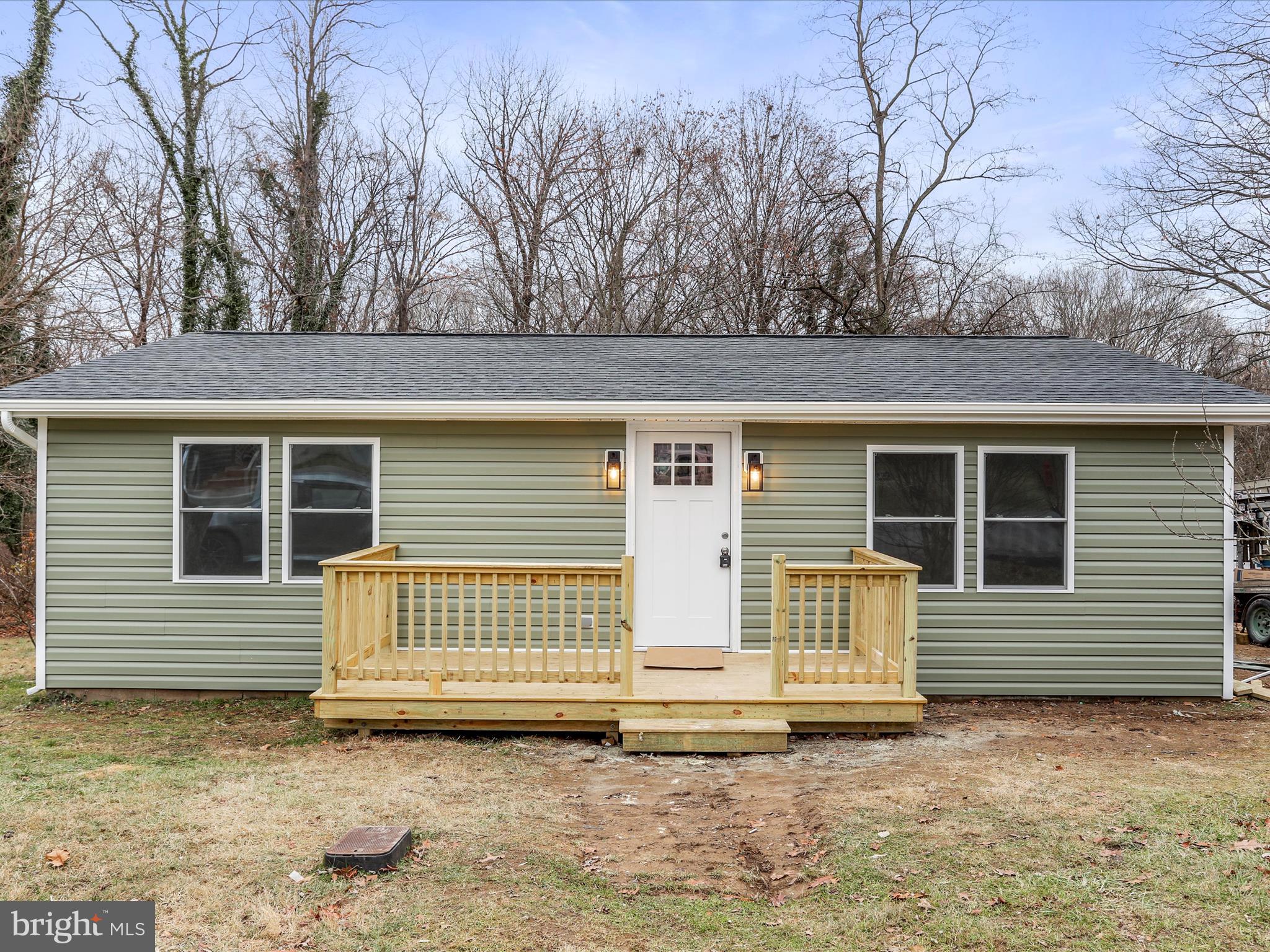 a house with trees in the background