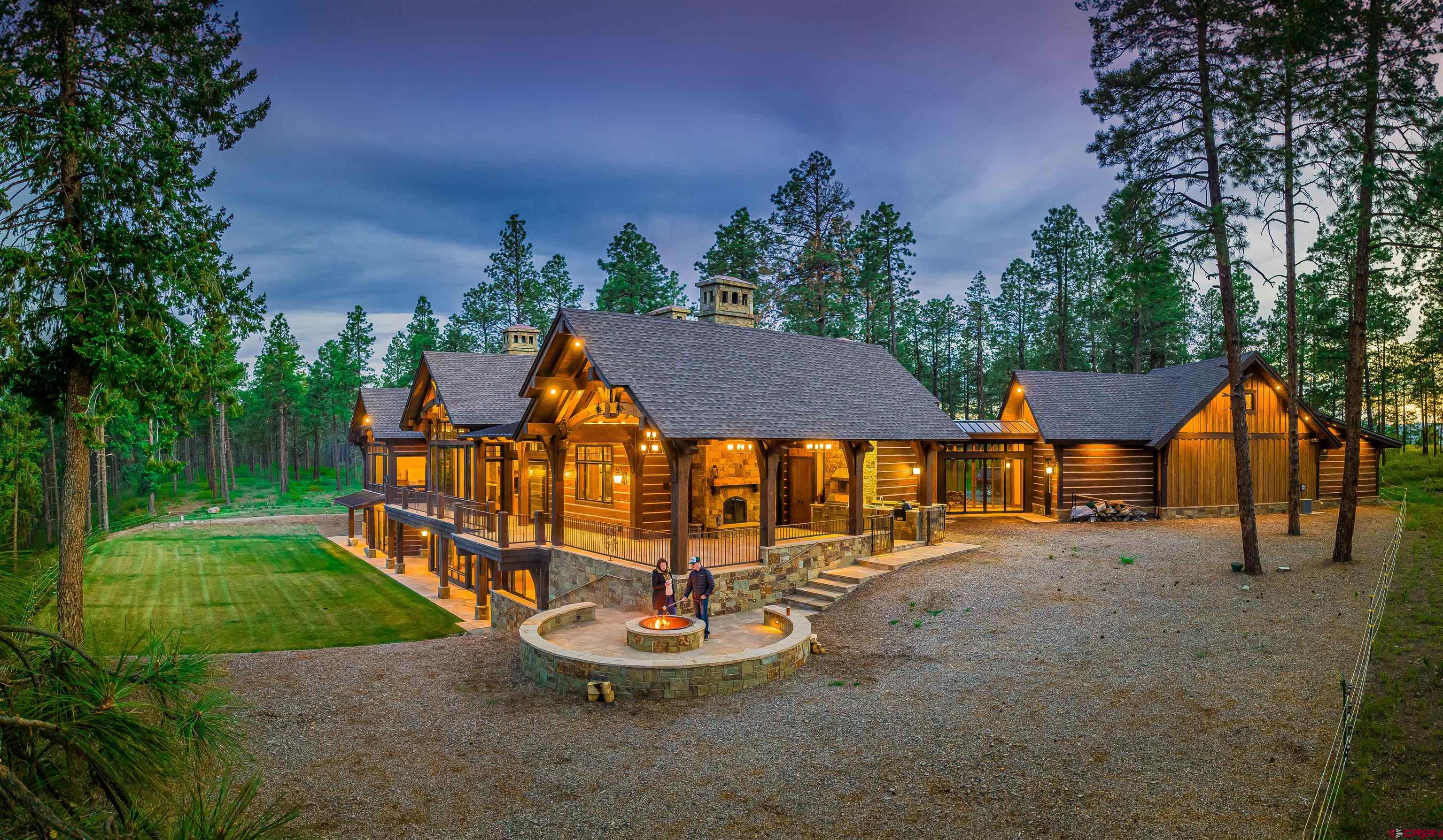 an outdoor space with furniture and garden