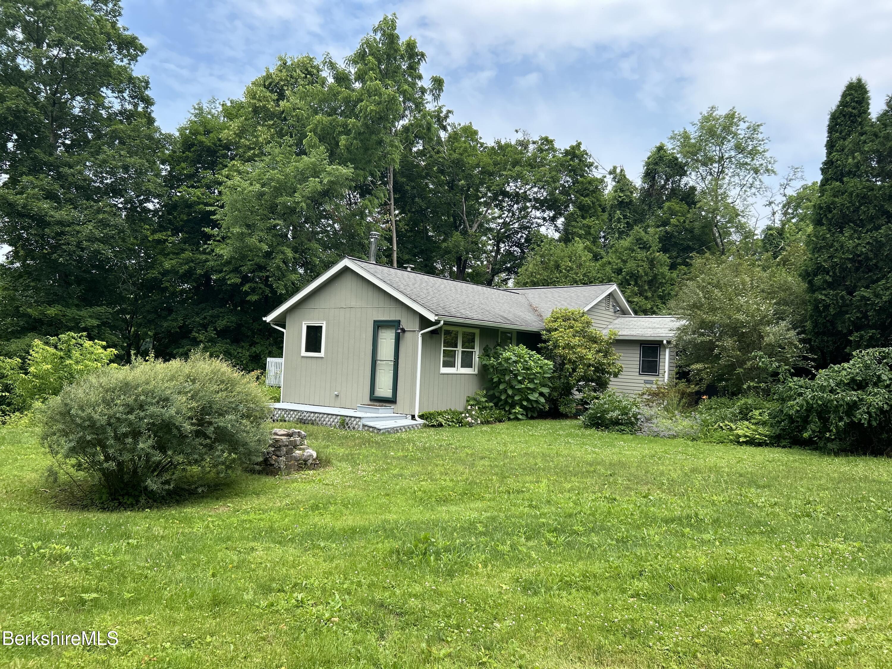 a house view with a garden space