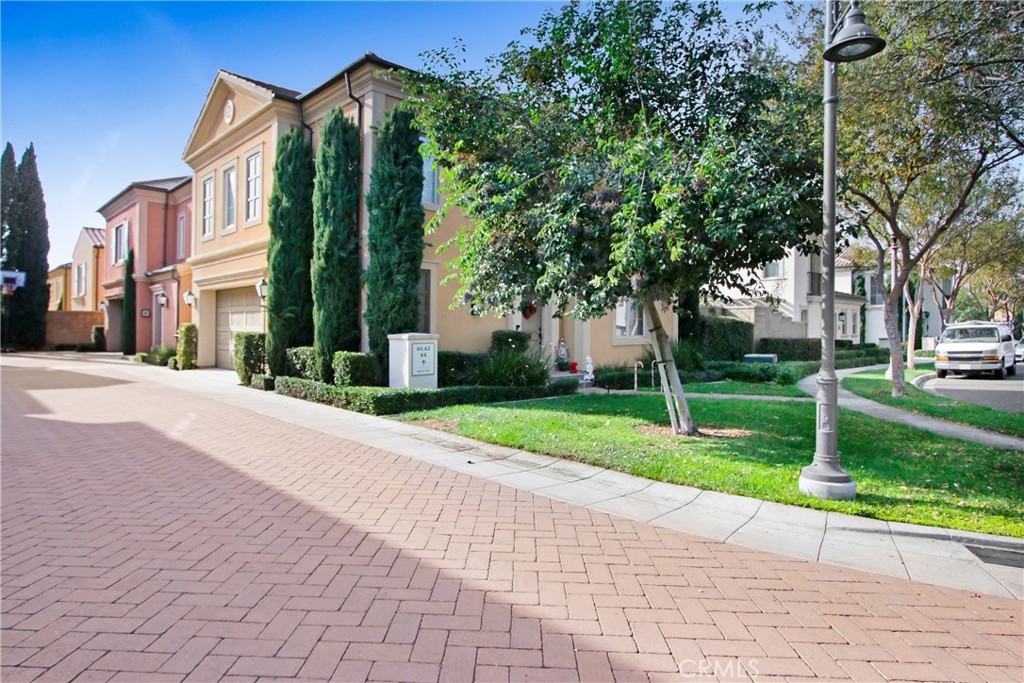 a view of a building with a yard