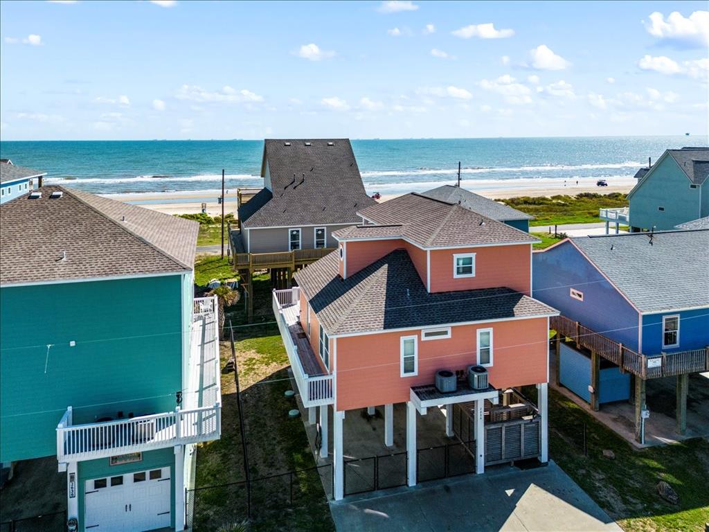 an aerial view of a house with swimming pool