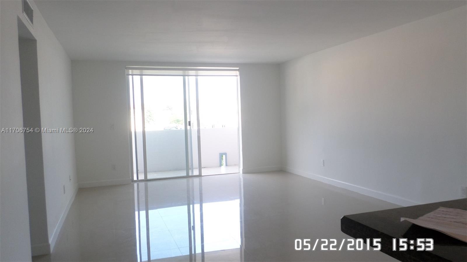 a view of a closet in an empty room