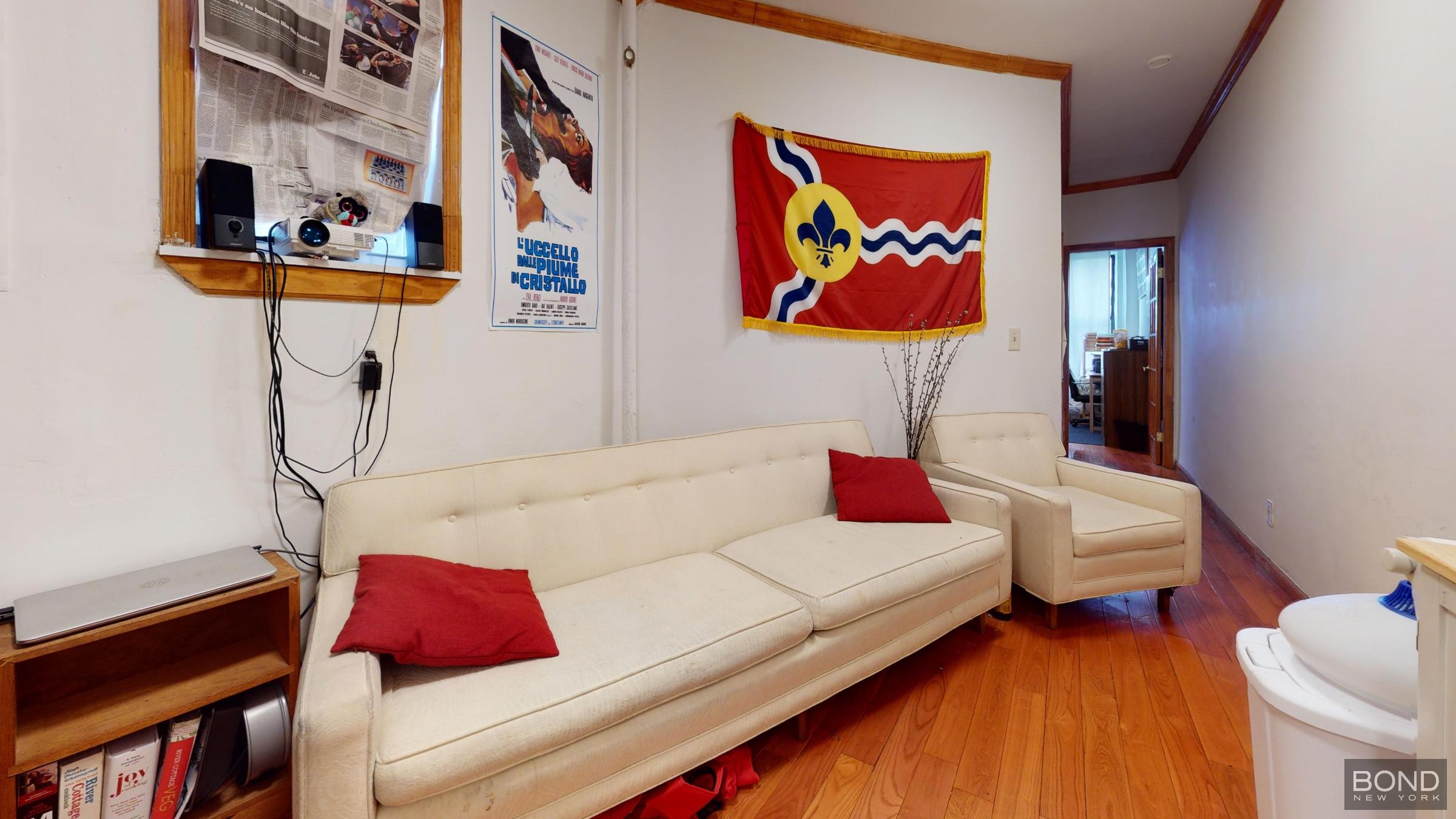 a living room with furniture and a couch