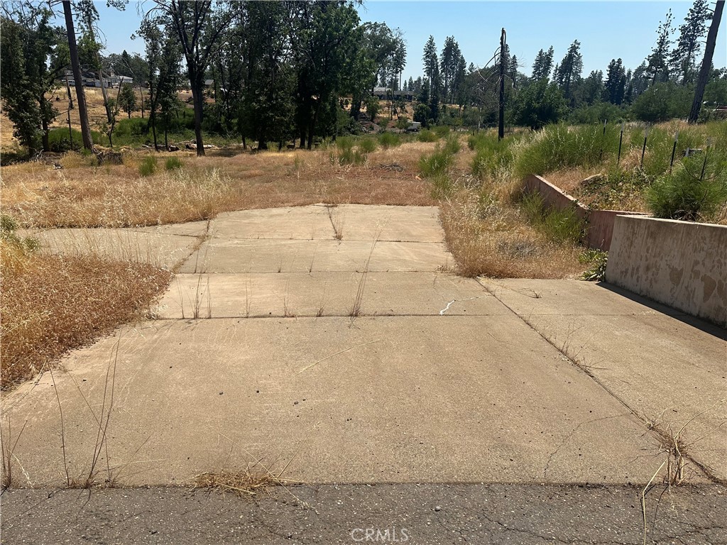 a view of a lake with a yard