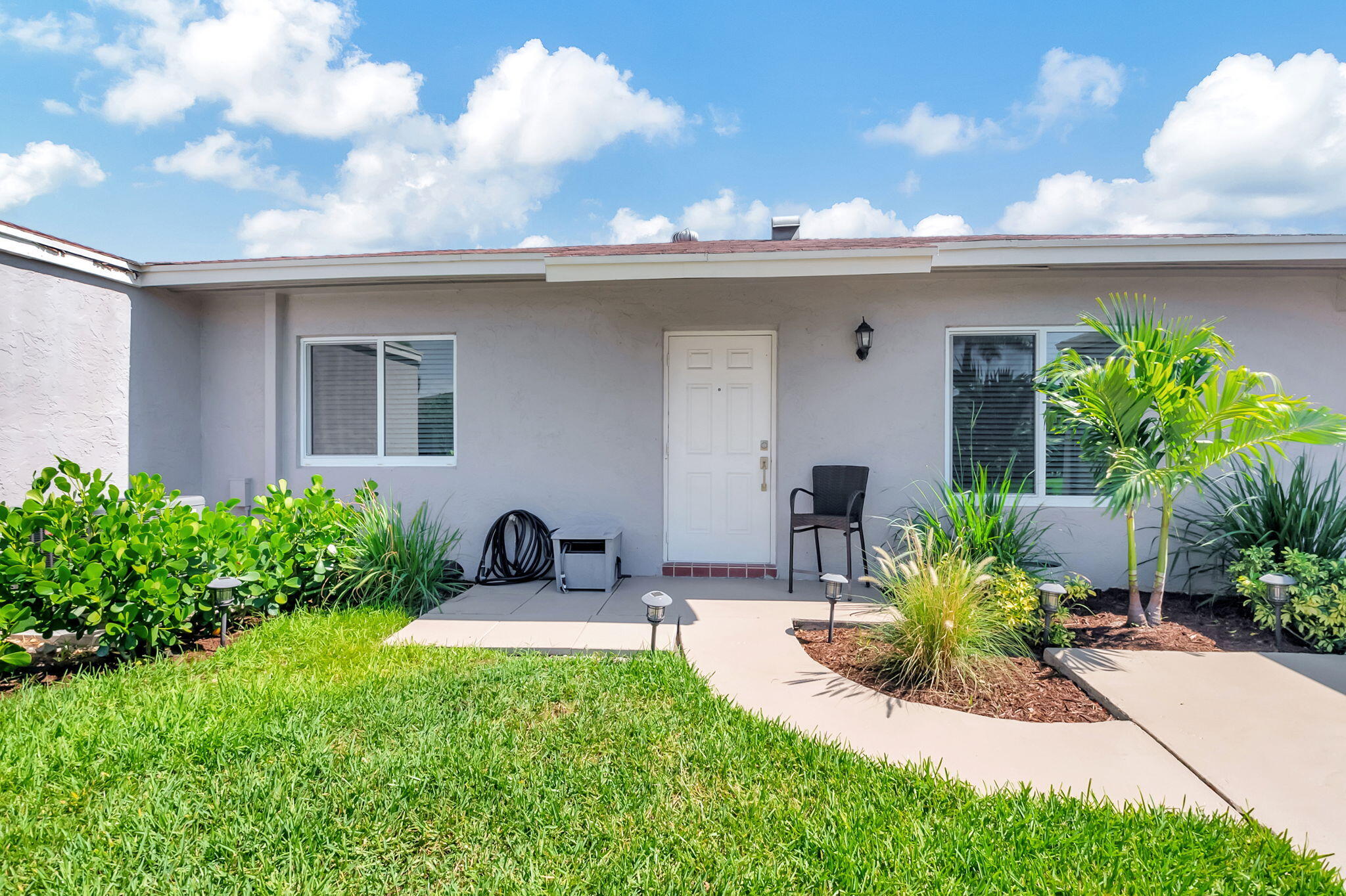 a view of a house with a patio