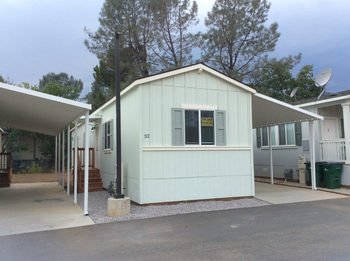 a view of a house with a garage