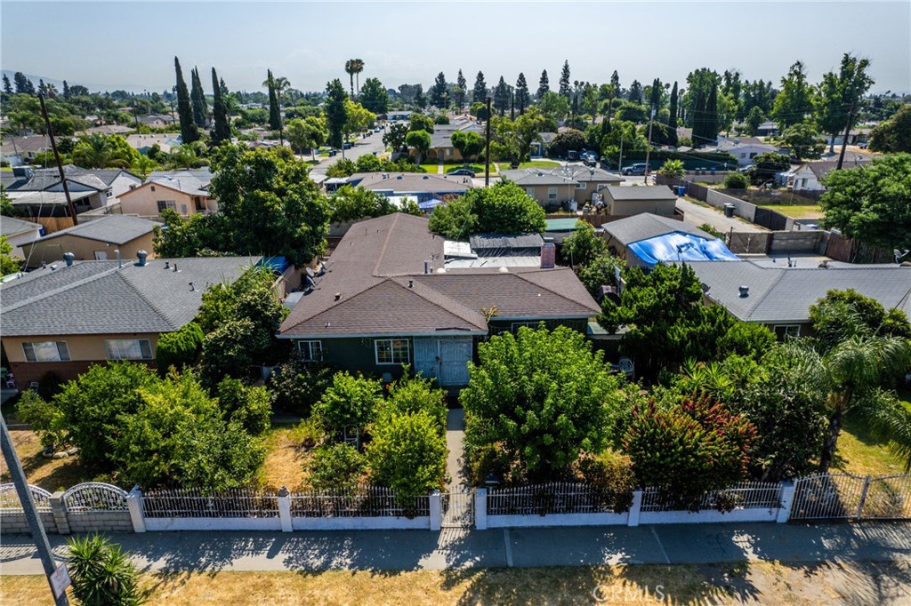 an aerial view of a house with a garden