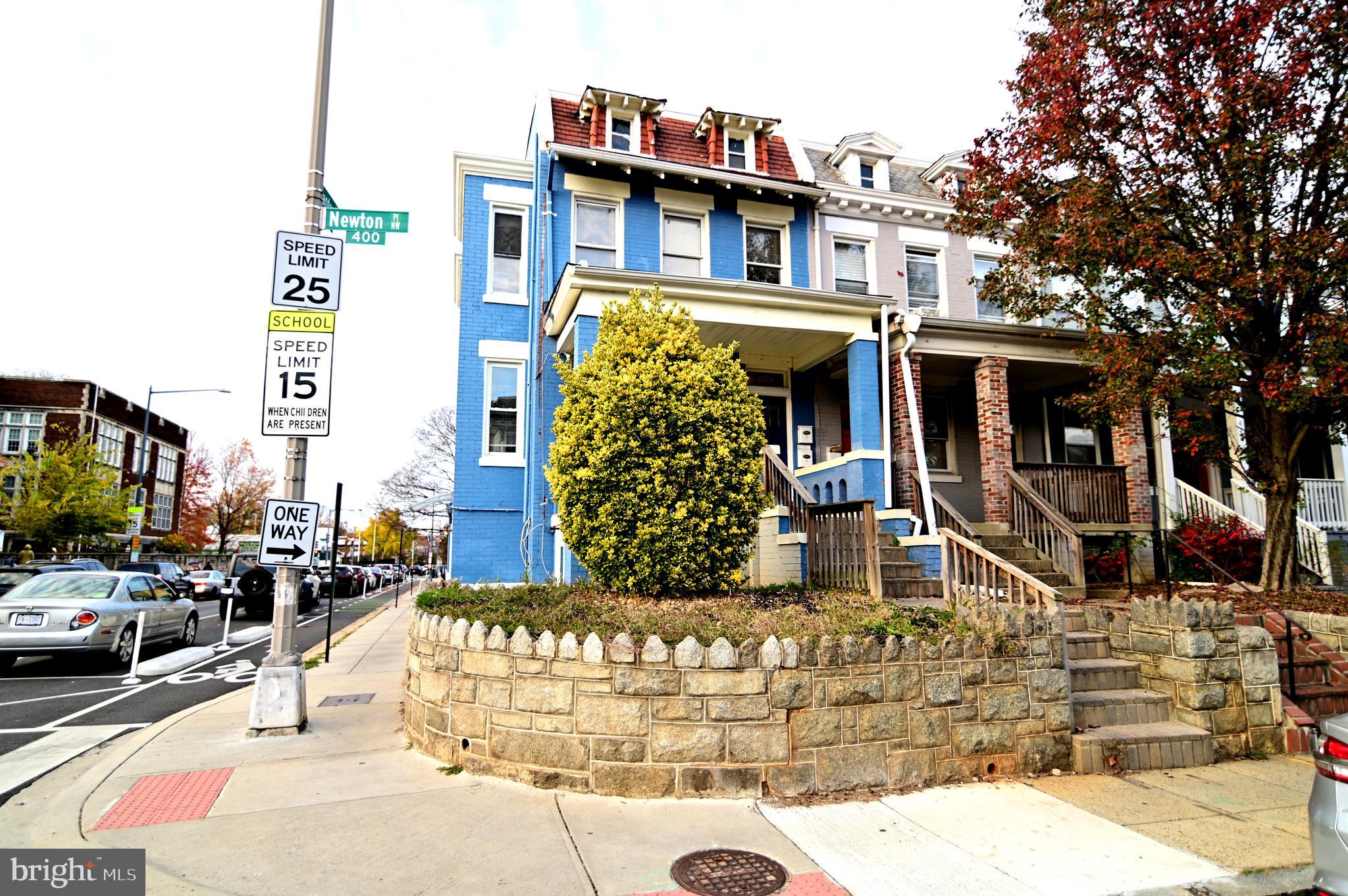 a front view of a building with street view