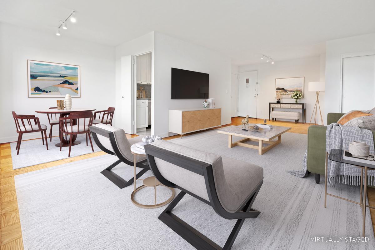 a living room with furniture wooden floor and a flat screen tv