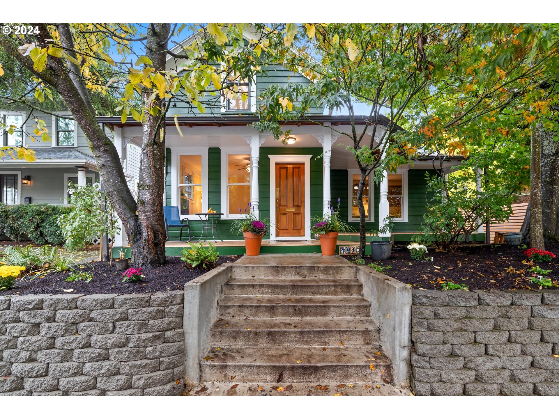 a front view of a house with garden