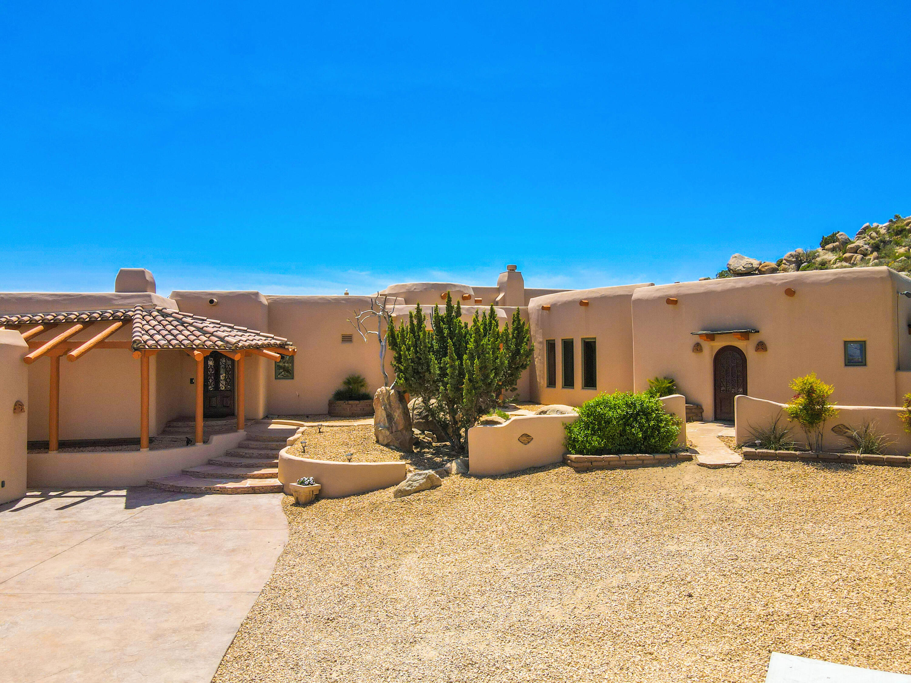 a front view of a house with patio