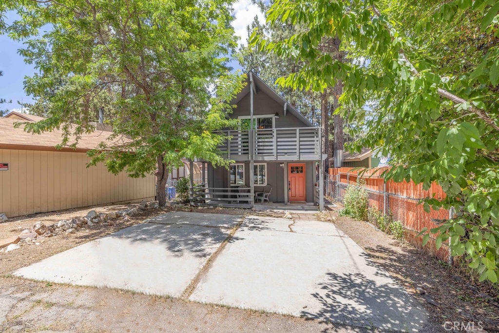 a view of a house with tree s