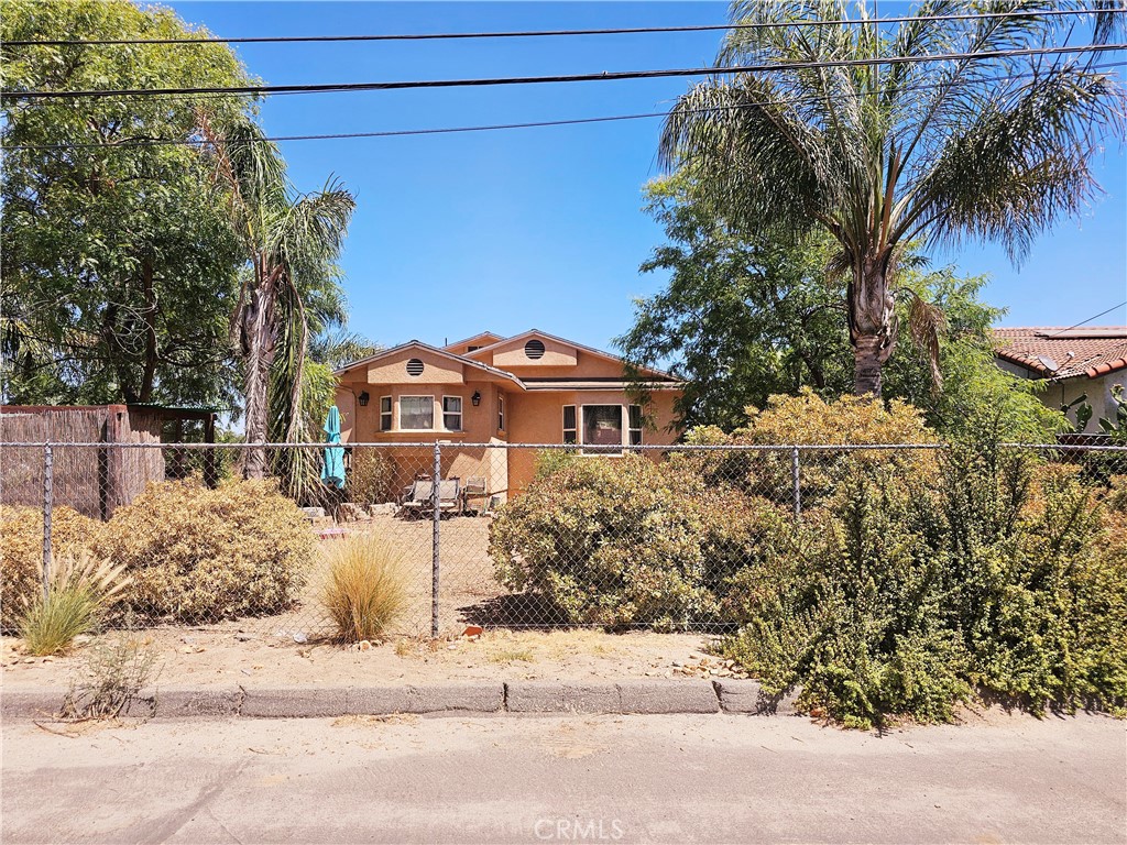 a view of a house with a street