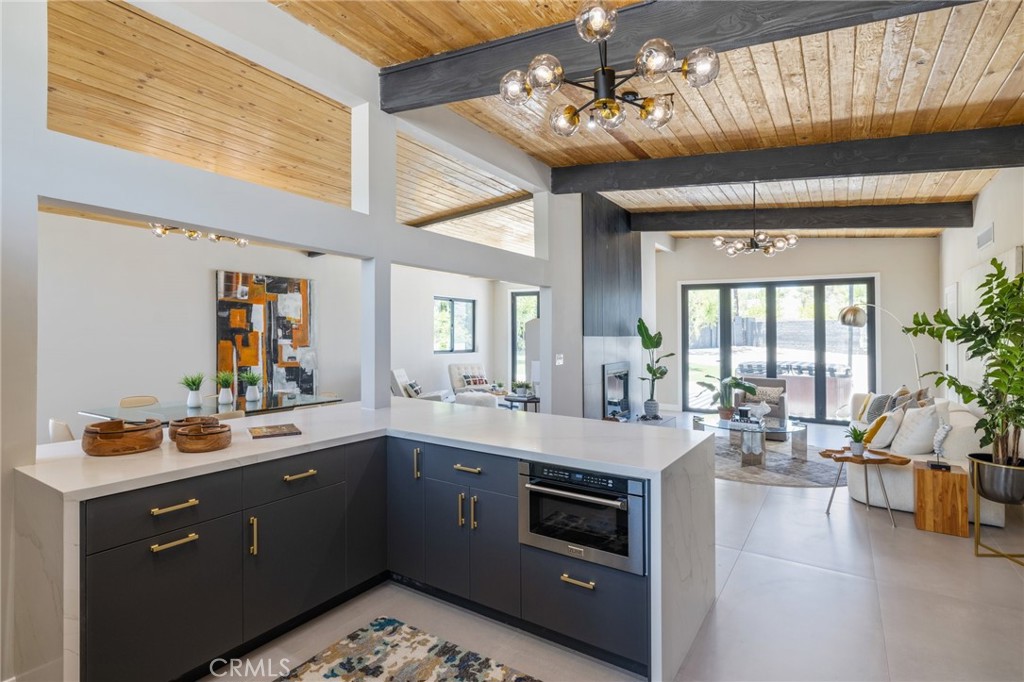 a large kitchen with a large window