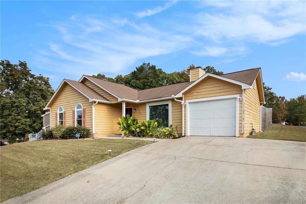 front view of a house with a yard