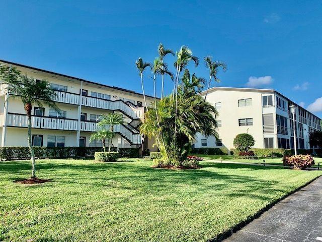 a view of building with yard