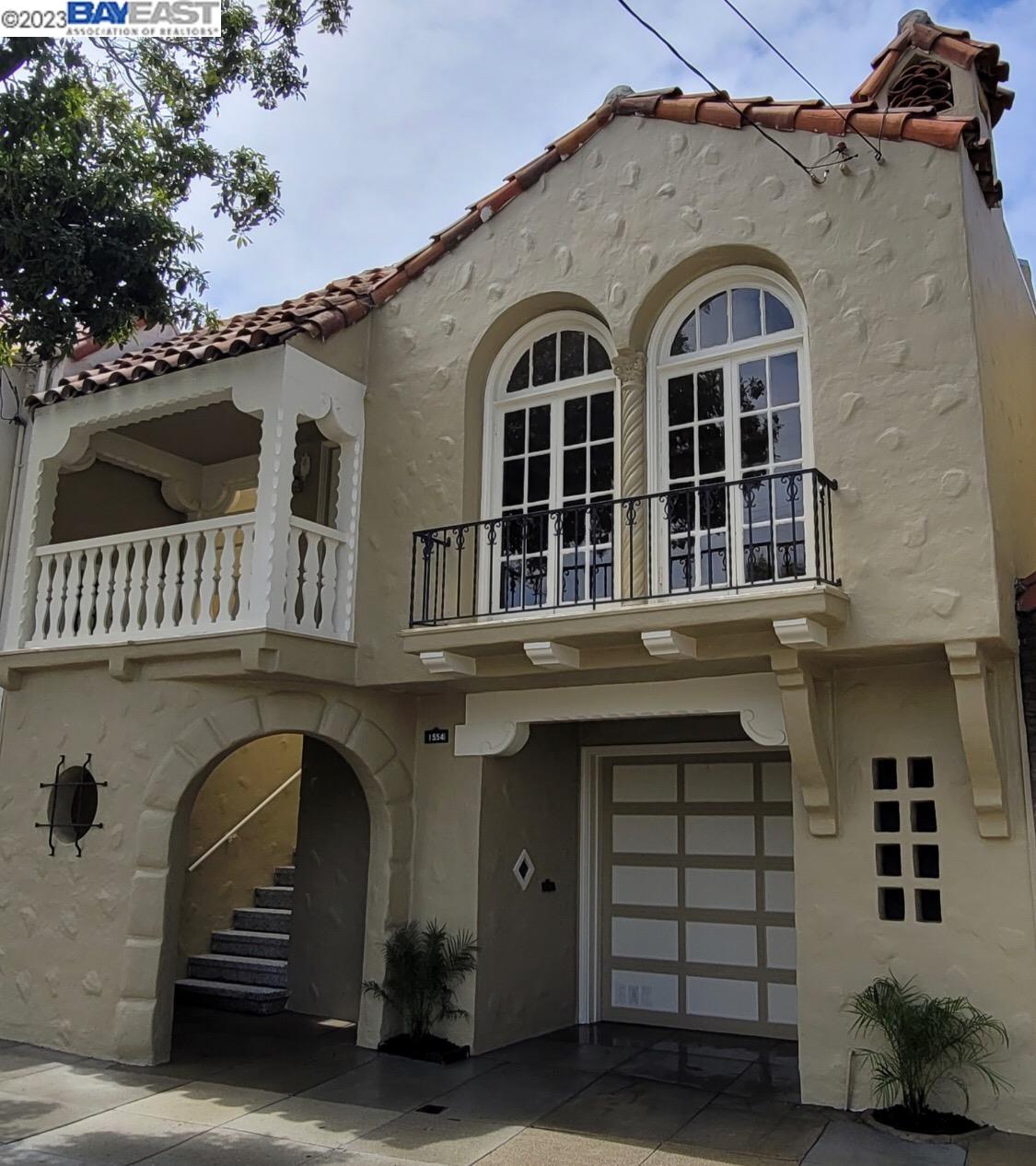 a front view of a house with a balcony