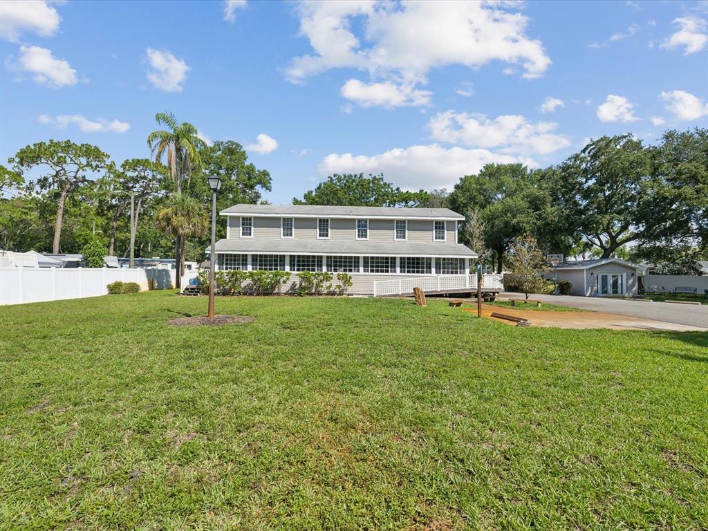 a view of a house with a big yard