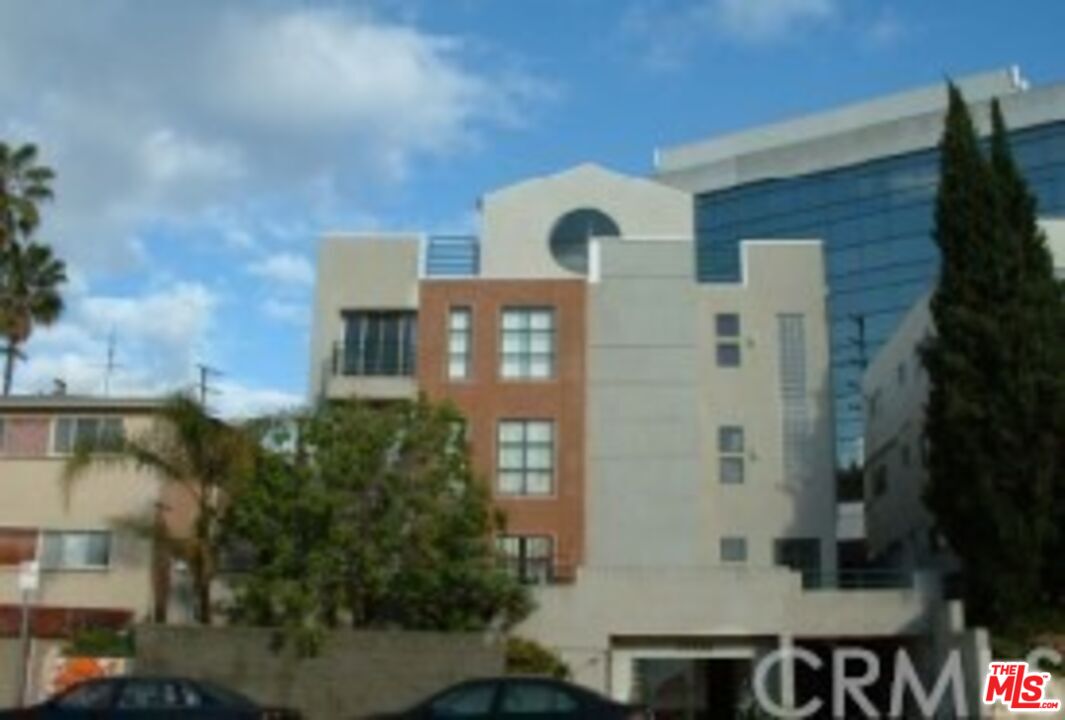 a front view of a building with balcony