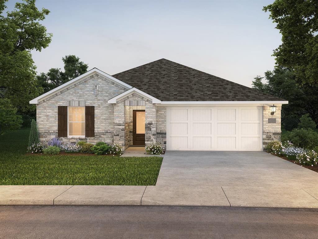 a view of a house with a yard and garage