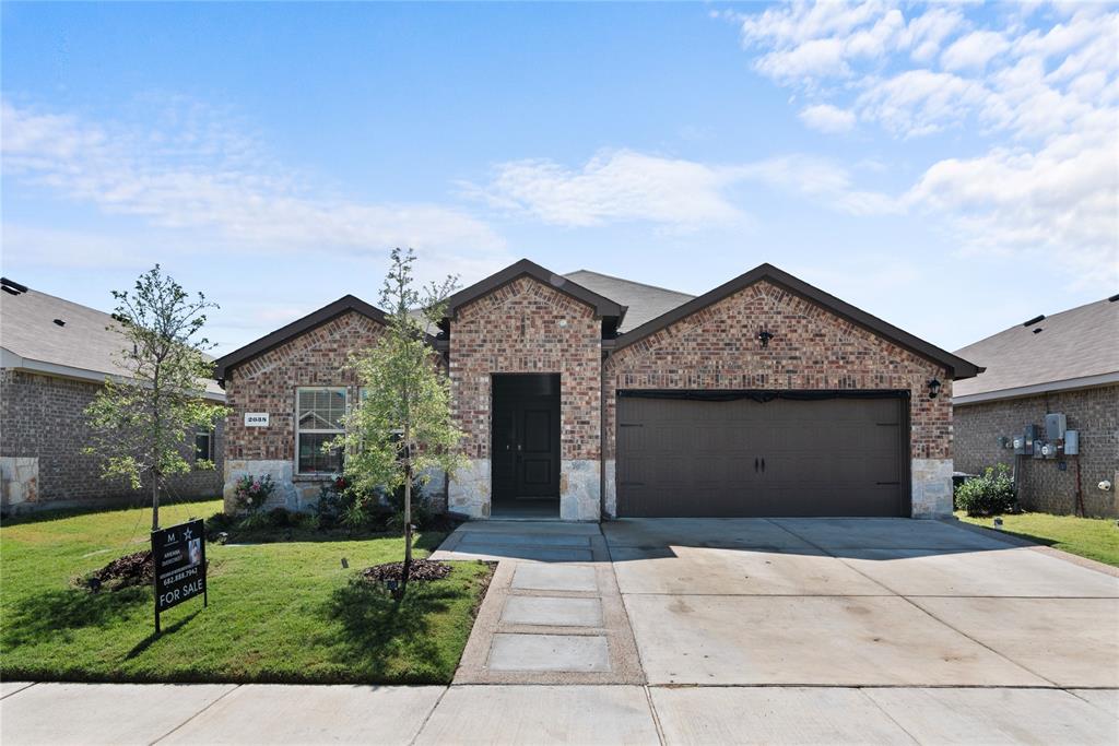 front view of a house with a yard