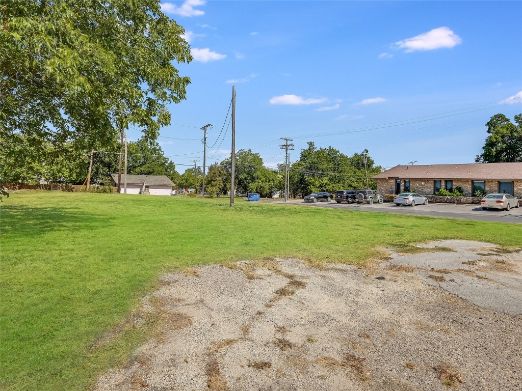 a view of a house with a big yard