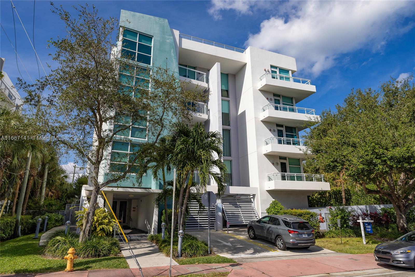 a front view of a building with street view