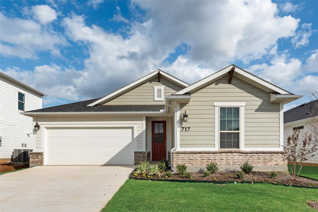 a front view of house with yard