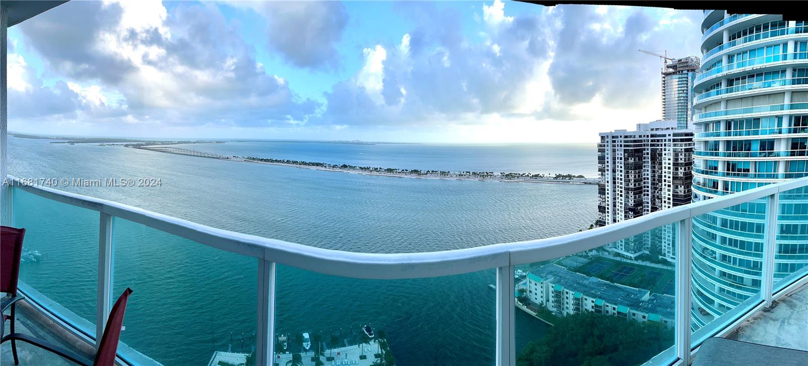 a view of swimming pool from a balcony