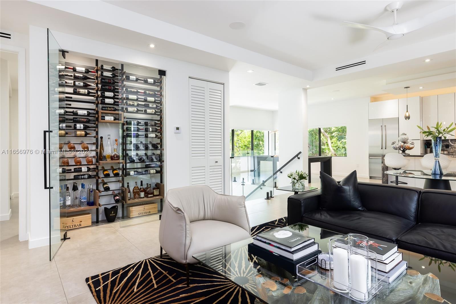 a living room with furniture and a rug