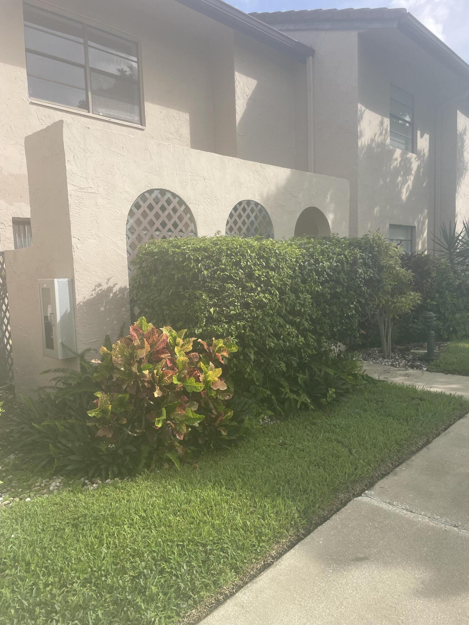 a view of a fountain in a yard