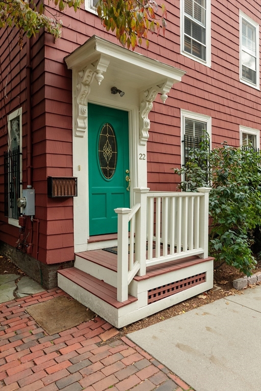 a view of a bench in front of a house