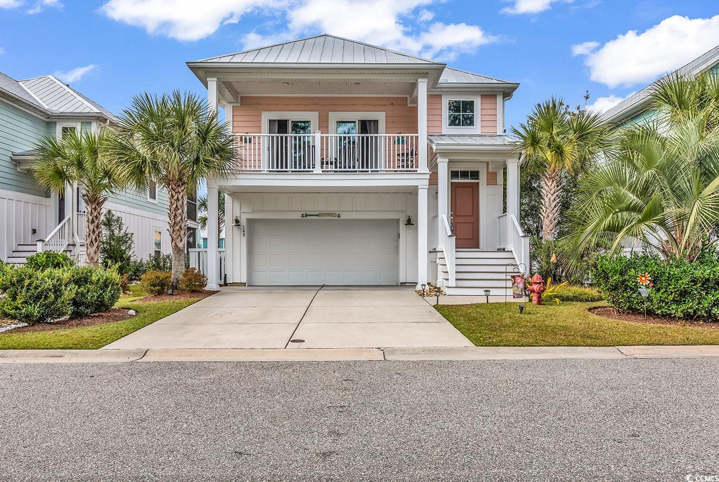 Beach home with a garage