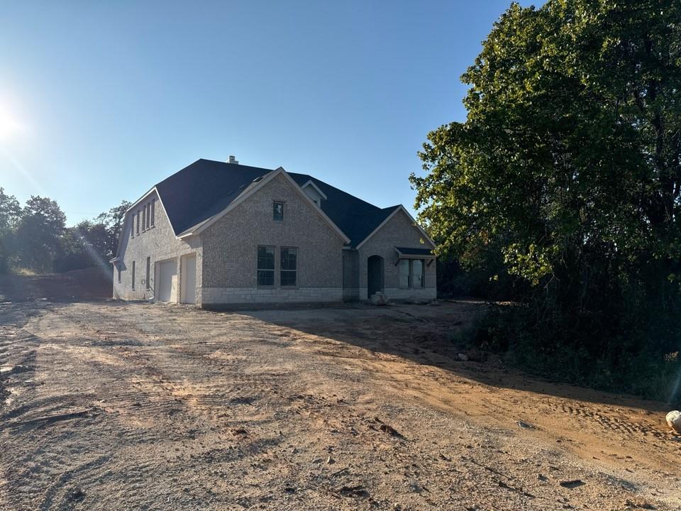 a house view with a outdoor space