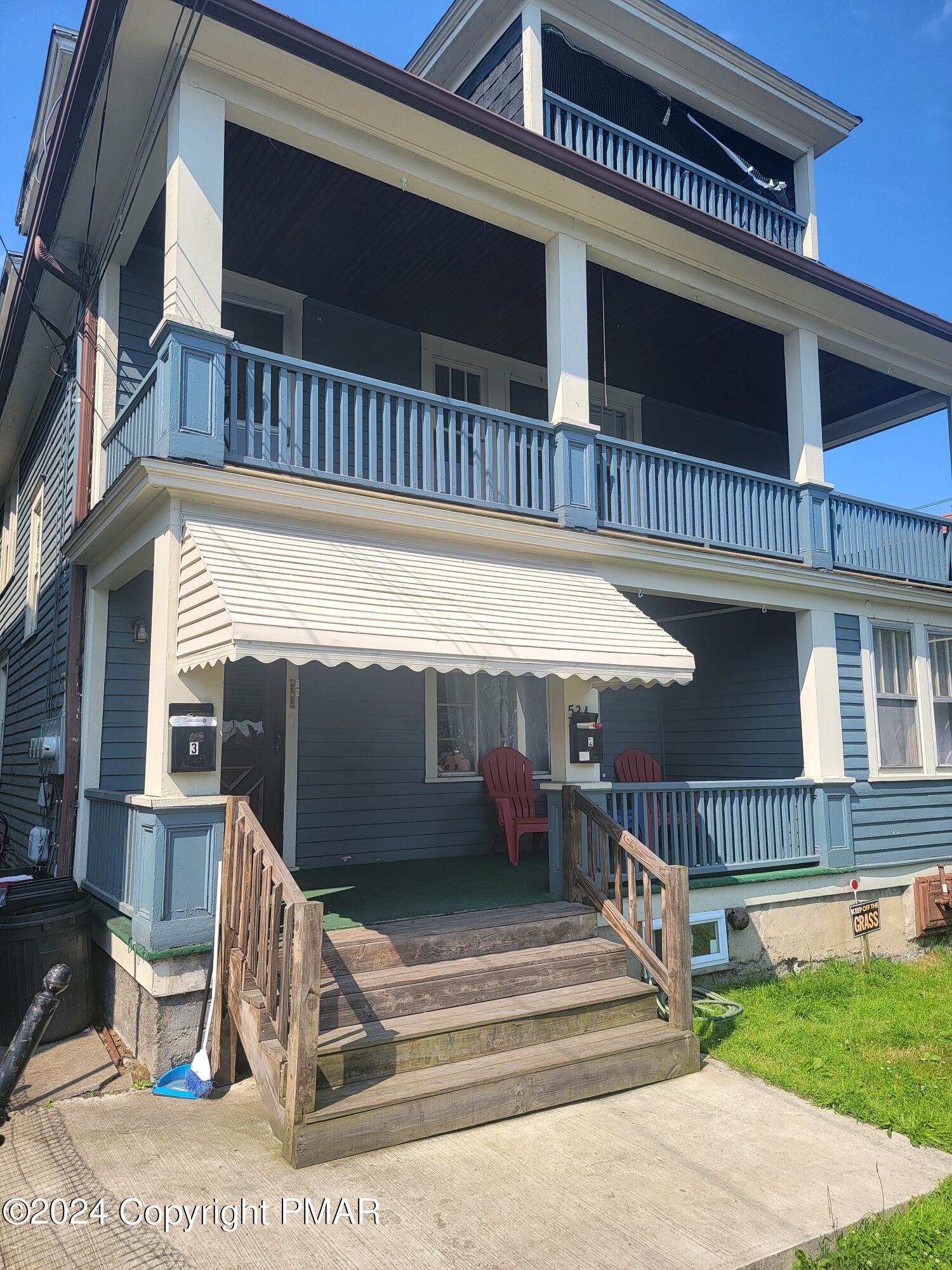 a view of a house with a balcony