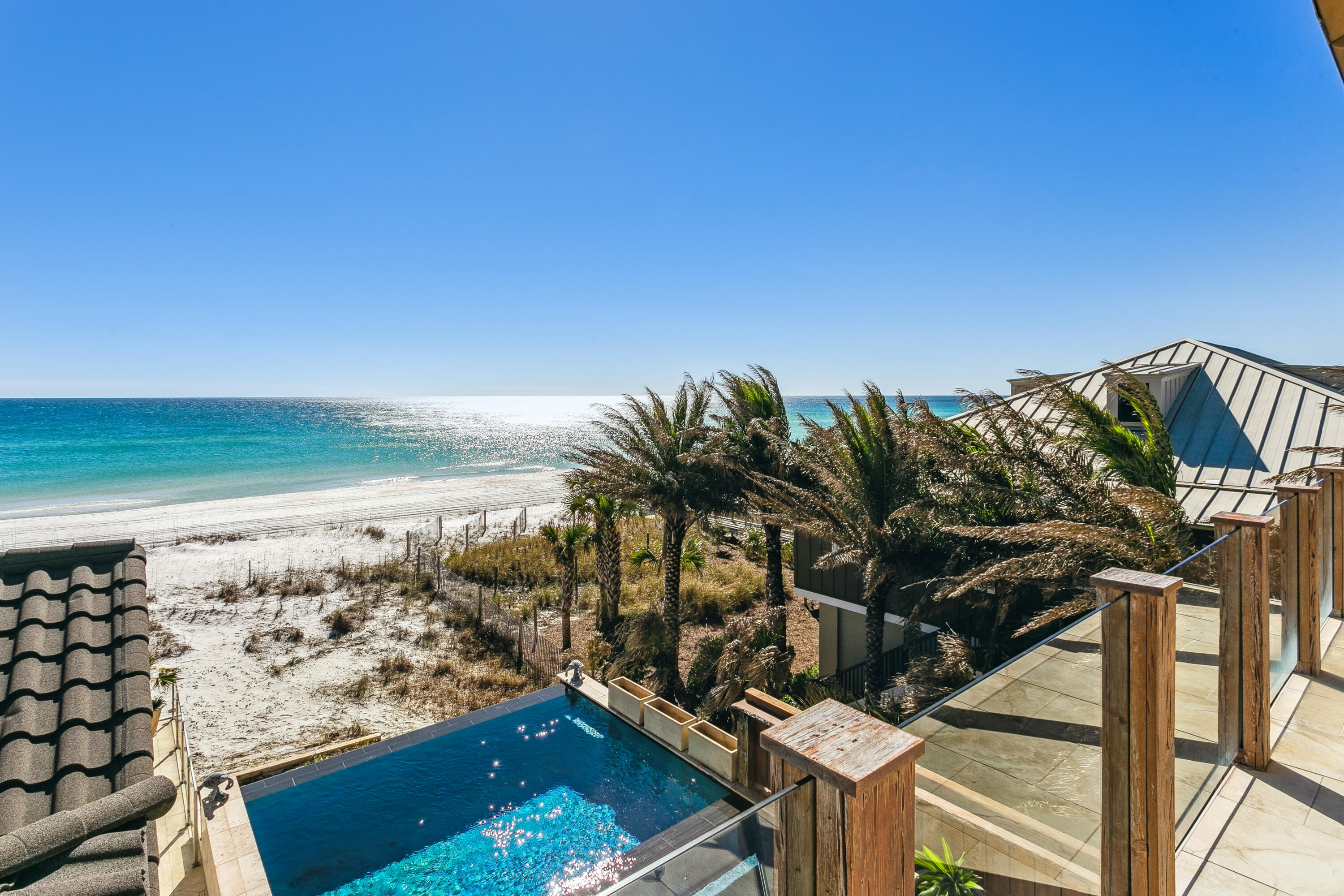 a view of a yard with an ocean view